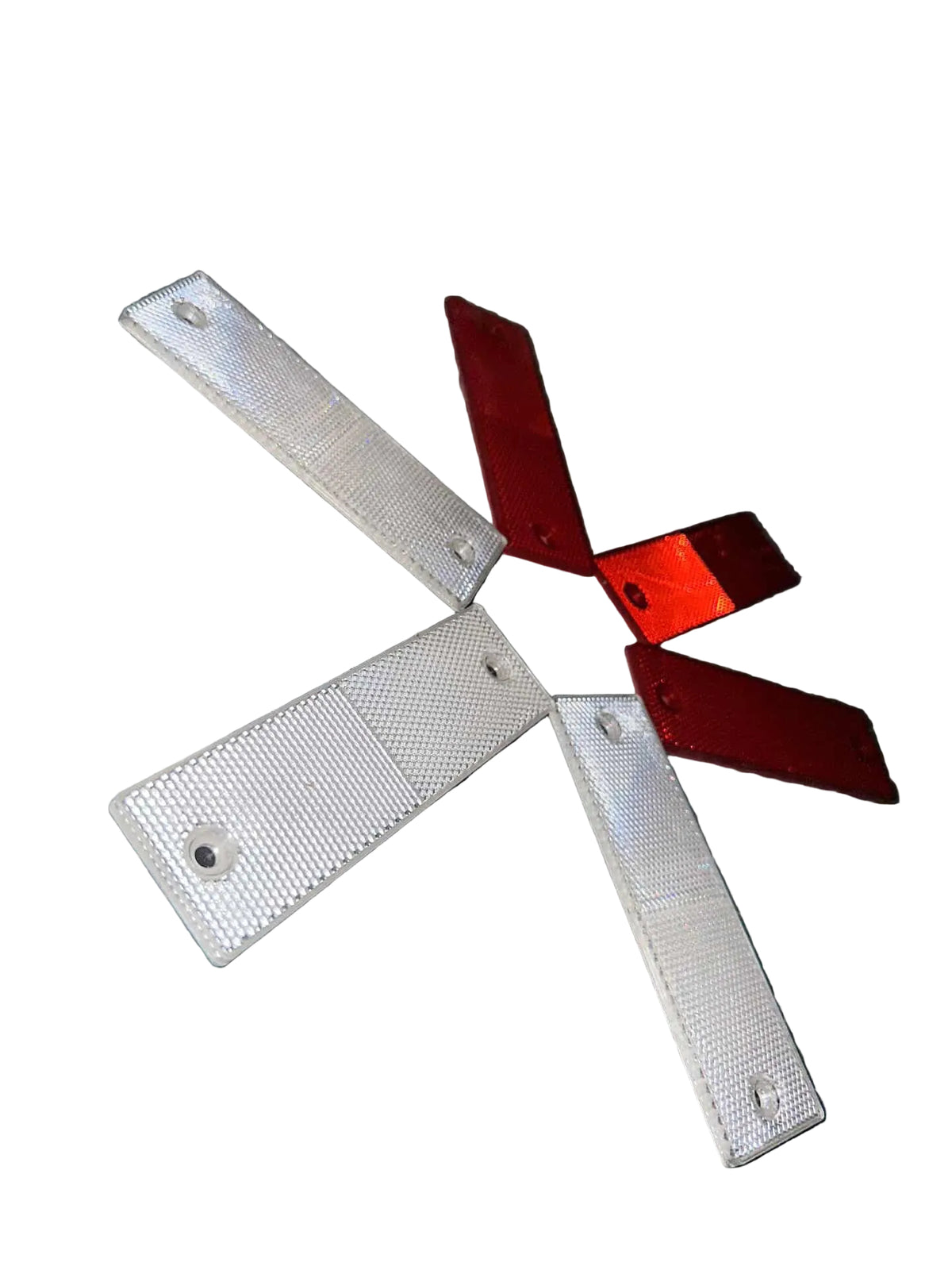 Six driveway reflector parts arranged in a star shape: three textured white rectangular reflectors and one red reflective cross-shaped reflector.